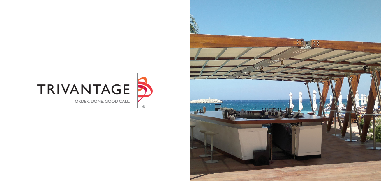 Adjustable architectural shade over a beachside bar